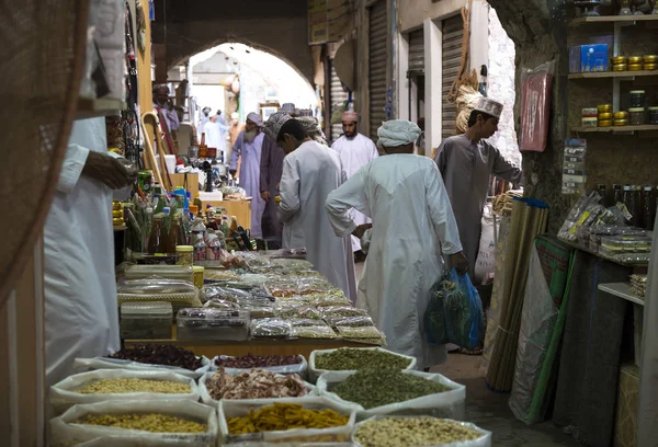 Old man in an old market — Stock Photo, Image