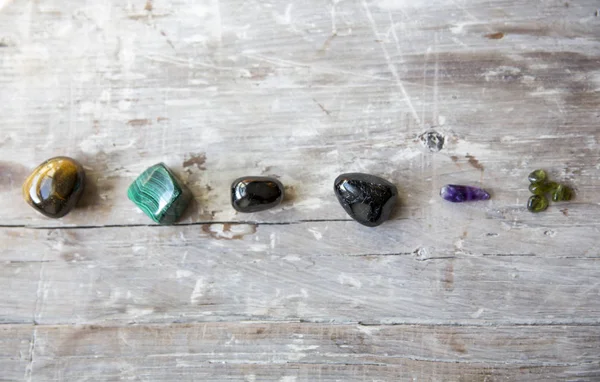 Crystals on a wooden board — Stock Photo, Image