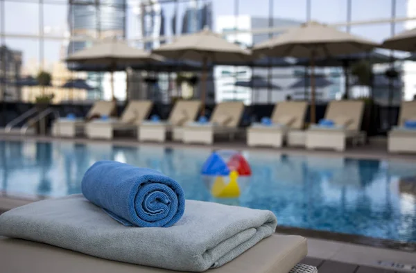 towel rolled up at swimming pool