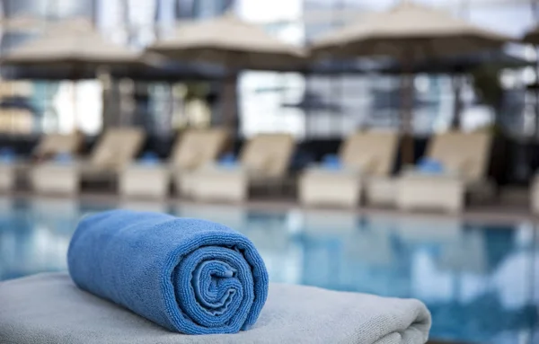 towel rolled up at swimming pool