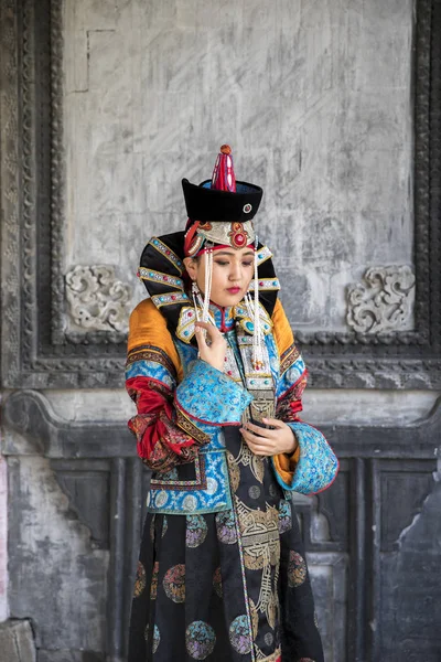 Mongolian woman in traditional outfit