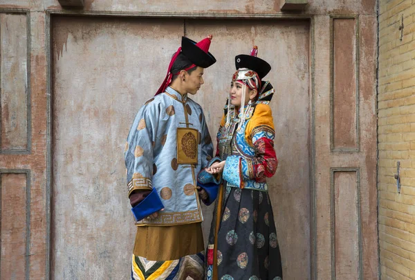 mongolian couple in traditional outfit