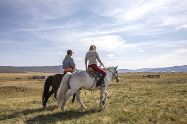 couple riding horses clipart