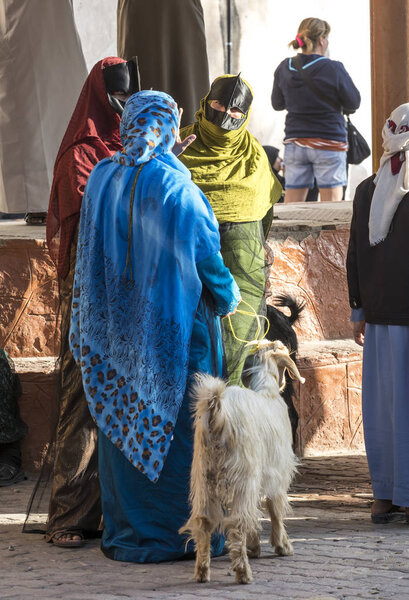 Nizwa, Oman, February 2, 2018:   omani women at a goat market