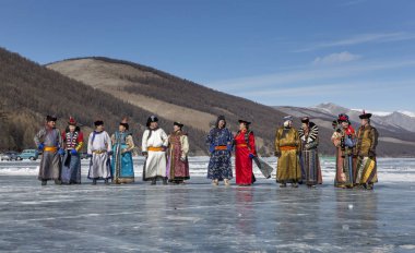mongolian people dressed in traditional clothing clipart