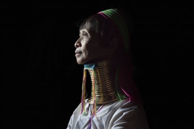 Lake Inle, Myanmar - November 17th, 2014: portrait of Kayan woman in her traditional outfit clipart
