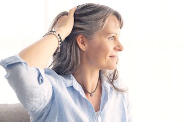 portrait of a middle aged woman with grey hair clipart