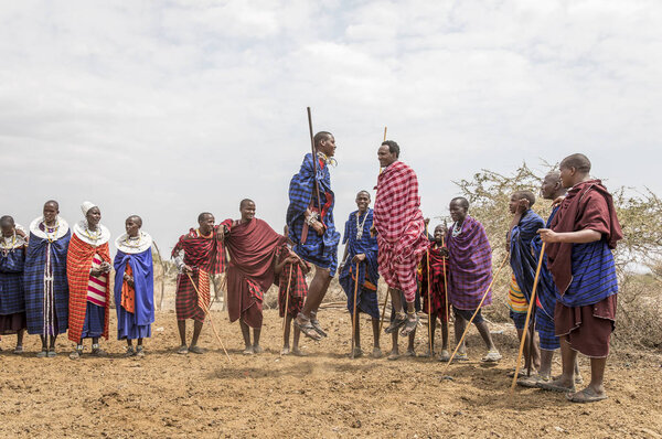 arusha, Tanzania, 7th September 2017: maasai men jumping to impress the ladies