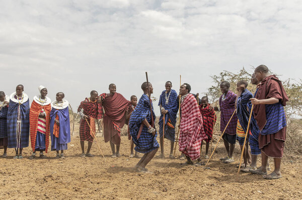arusha, Tanzania, 7th September 2017: maasai men jumping to impress the ladies