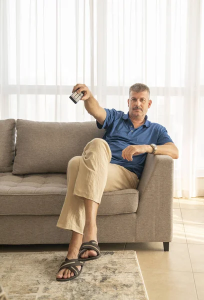 Middle Aged Man Sitting Sofa Watching — Stock Photo, Image