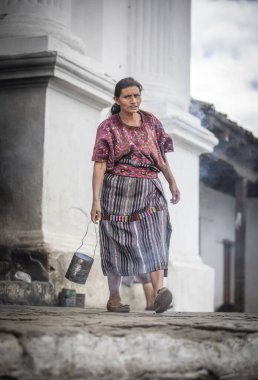Chichicastenango, Guatemala, 27th February 2020: Old mayan woman walking out of church