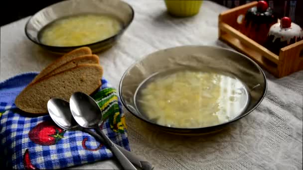 Two bowls of soup on the table — Stock Video