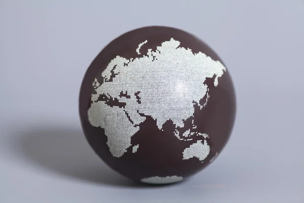 Глобус Землі на сірий фон — стокове фото