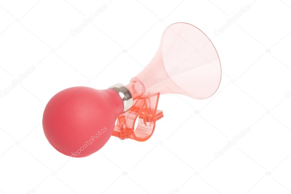 Red plastic air horn isolated on white background