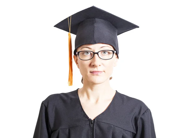 Female bachelor with eyeglasses in mantle and graduation hat — Stock Photo, Image