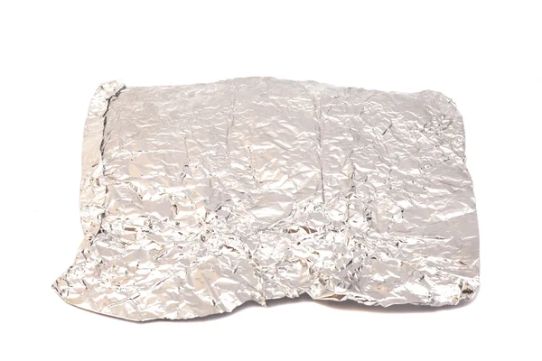 Folha de alumínio isolado em fundo branco — Fotografia de Stock