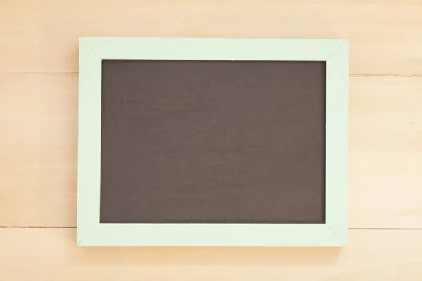 Escola de madeira em branco quadro negro — Fotografia de Stock