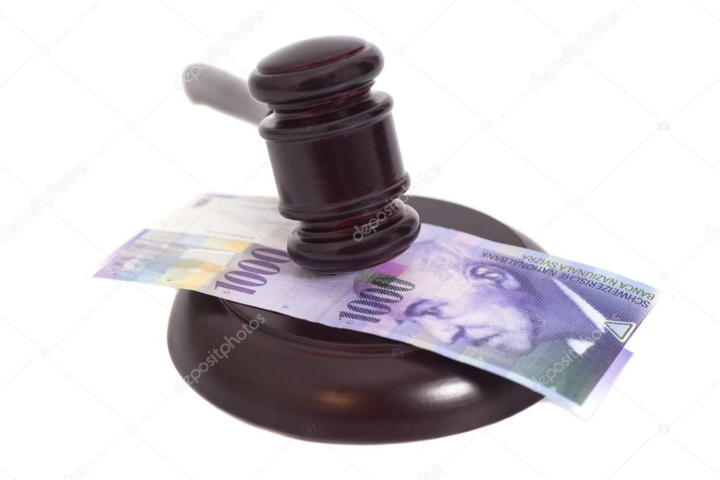 Judge Gavel and Swiss Thousand Franc Currency