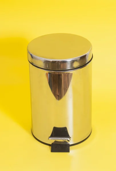 Garbage bin on yellow background — Stock Photo, Image