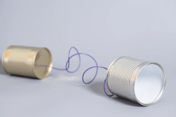 Tin can phone.communication koncept — Stock fotografie