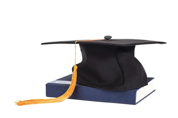 Graduation Cap On  Book — Stock Photo, Image