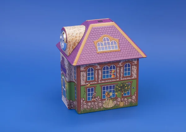 模型的蓝色背景上的房子 — 图库照片