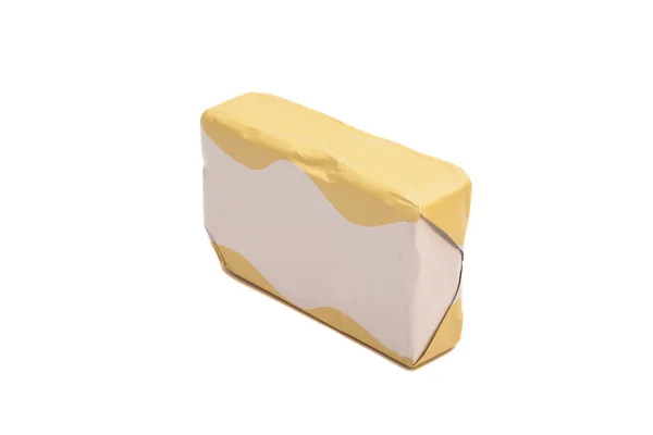 白い背景にラップされたバターの棒 — ストック写真