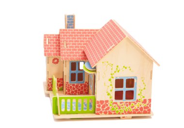 Beyaz arka planda emlak Concept.Wooden ev