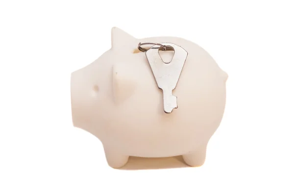 Piggy bank with a key — Stock Photo, Image