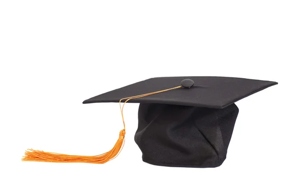 Chapéu de graduação preto com borla de ouro — Fotografia de Stock