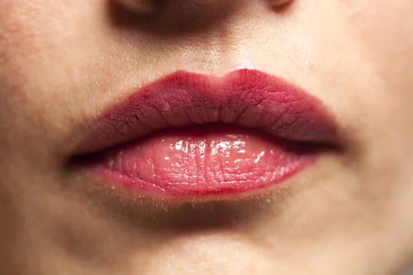 Closeup of beautiful sexy plump red woman lips with lipstick — Stock Photo, Image