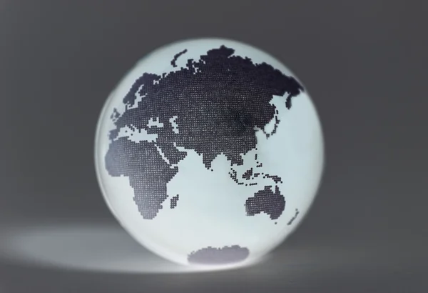 Глобус Землі на зеленому тлі — стокове фото