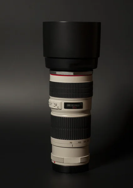 Camera photo lens over black background — Stock Photo, Image