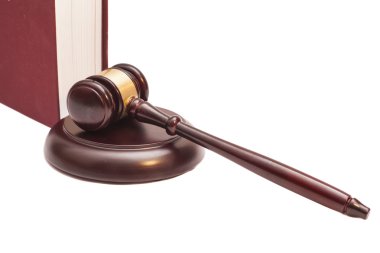 Tokmak ve beyaz arka plan üzerinde kitap 