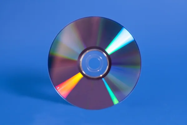 Compact disk on blue — Stock Photo, Image