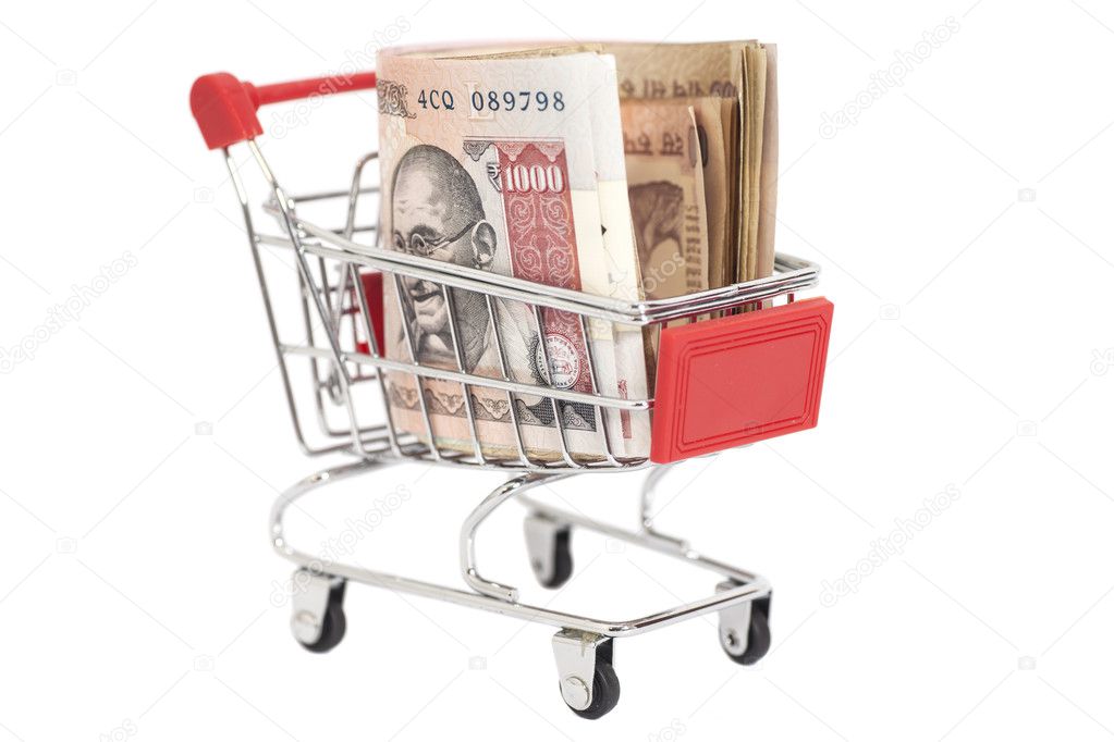 Indian 1000 rupees in shopping cart isolated on white background