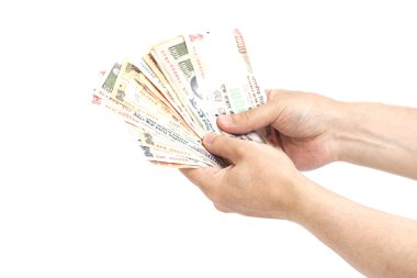 Hand with Indian rupee notes clipart