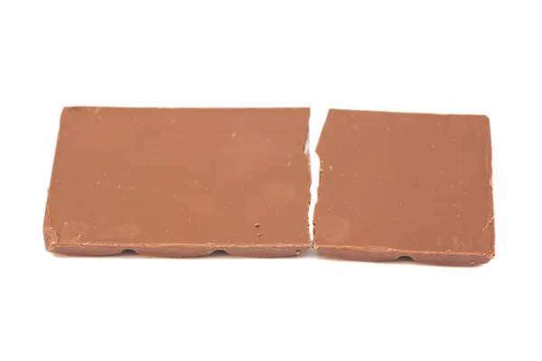 Broken chocolate bar on a white background — Stock Photo, Image