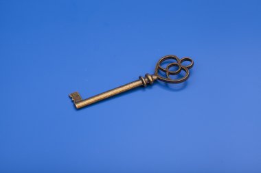 Mavi arka plan üzerinde Vintage anahtar