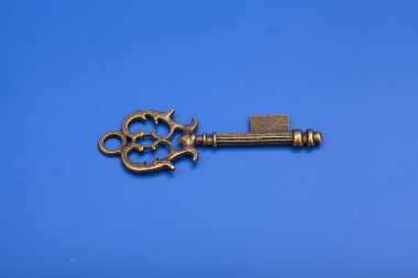 Mavi arka plan üzerinde Vintage anahtar