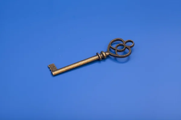 Vintage Key on blue background