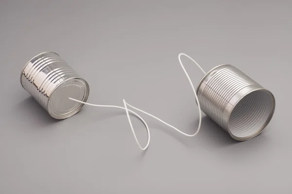 Tin can phone.communication concepto —  Fotos de Stock