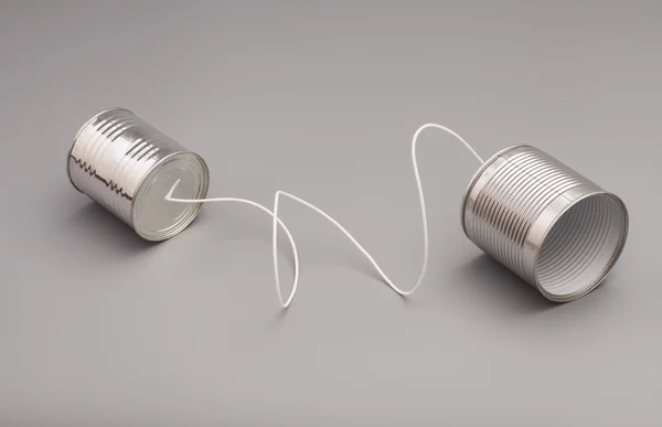 Tin can phone.communication concepto —  Fotos de Stock