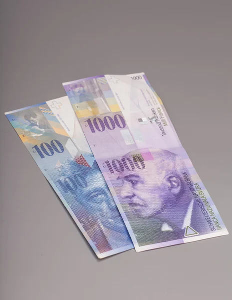 Franco svizzero, valuta della Svizzera isolata su grigio — Foto Stock