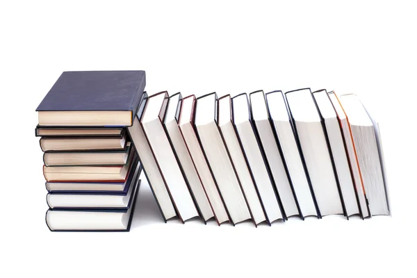 Hromada knih izolovaných na bílém pozadí — Stock fotografie