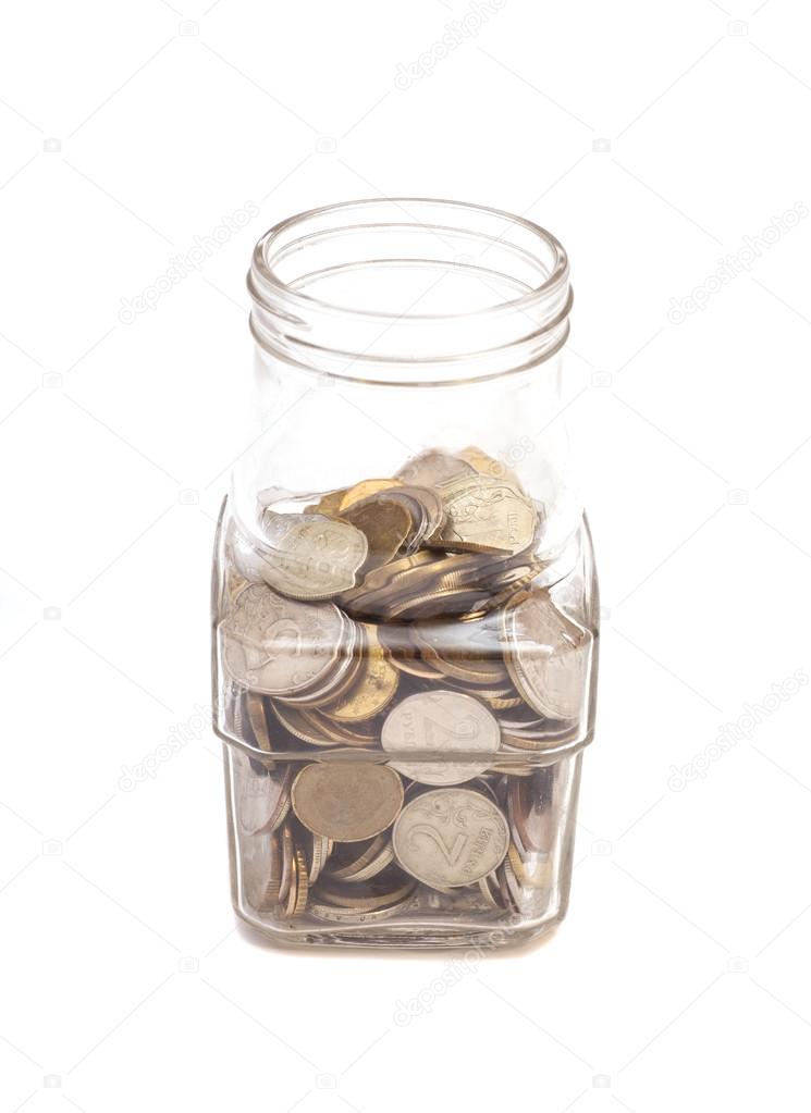 Jar with Coins money on white 