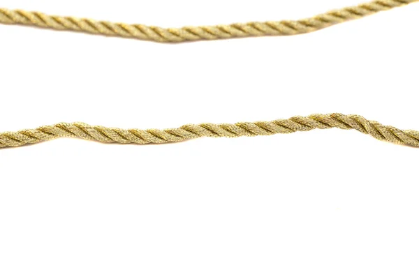 Золота мотузка ізольована на білому тлі — стокове фото