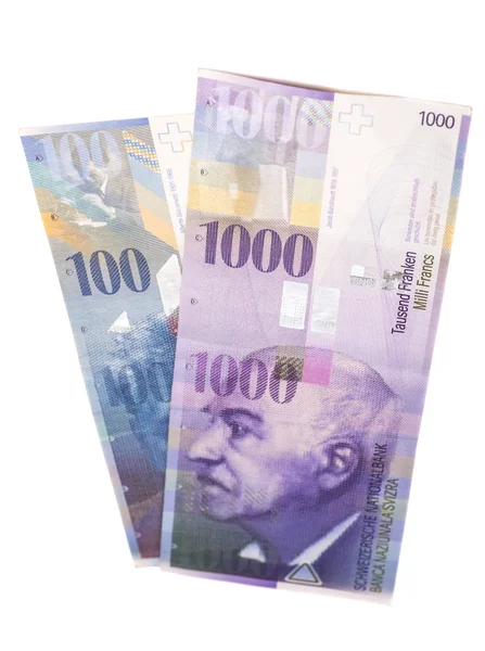 Billetes suizos de 1000 y 100 francos aislados en blanco — Foto de Stock