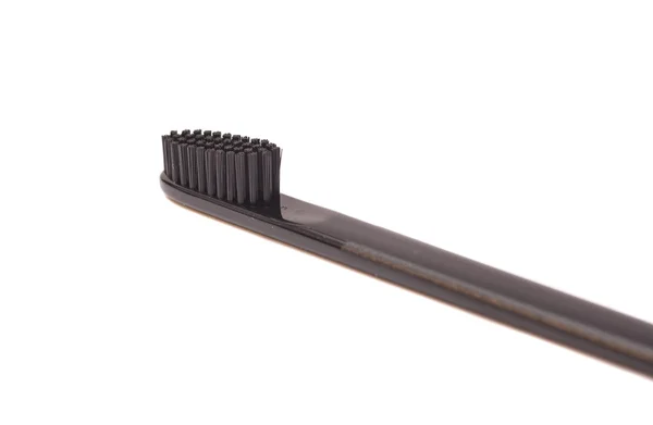 Black toothbrush  on white background — Stock Photo, Image