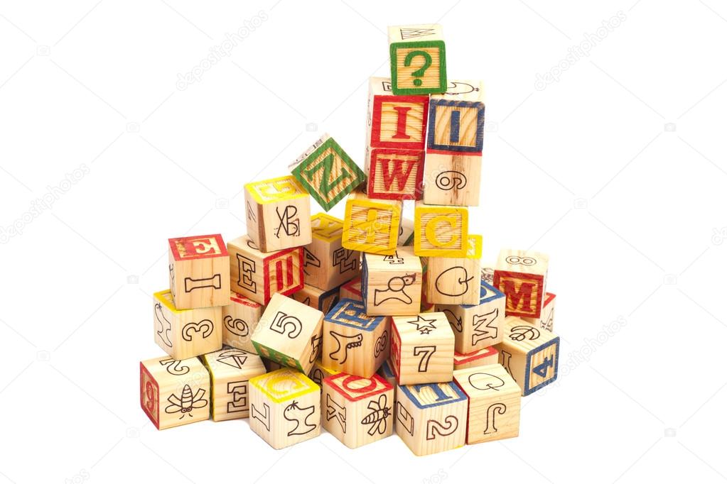 Wooden toy cubes with letters. Wooden alphabet blocks